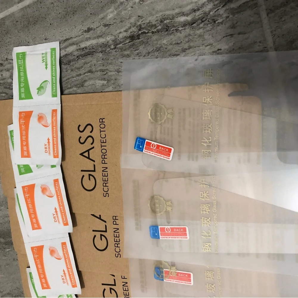 Six pack of iPhone 5s glass screen protectors with wipes to clean phone & screen